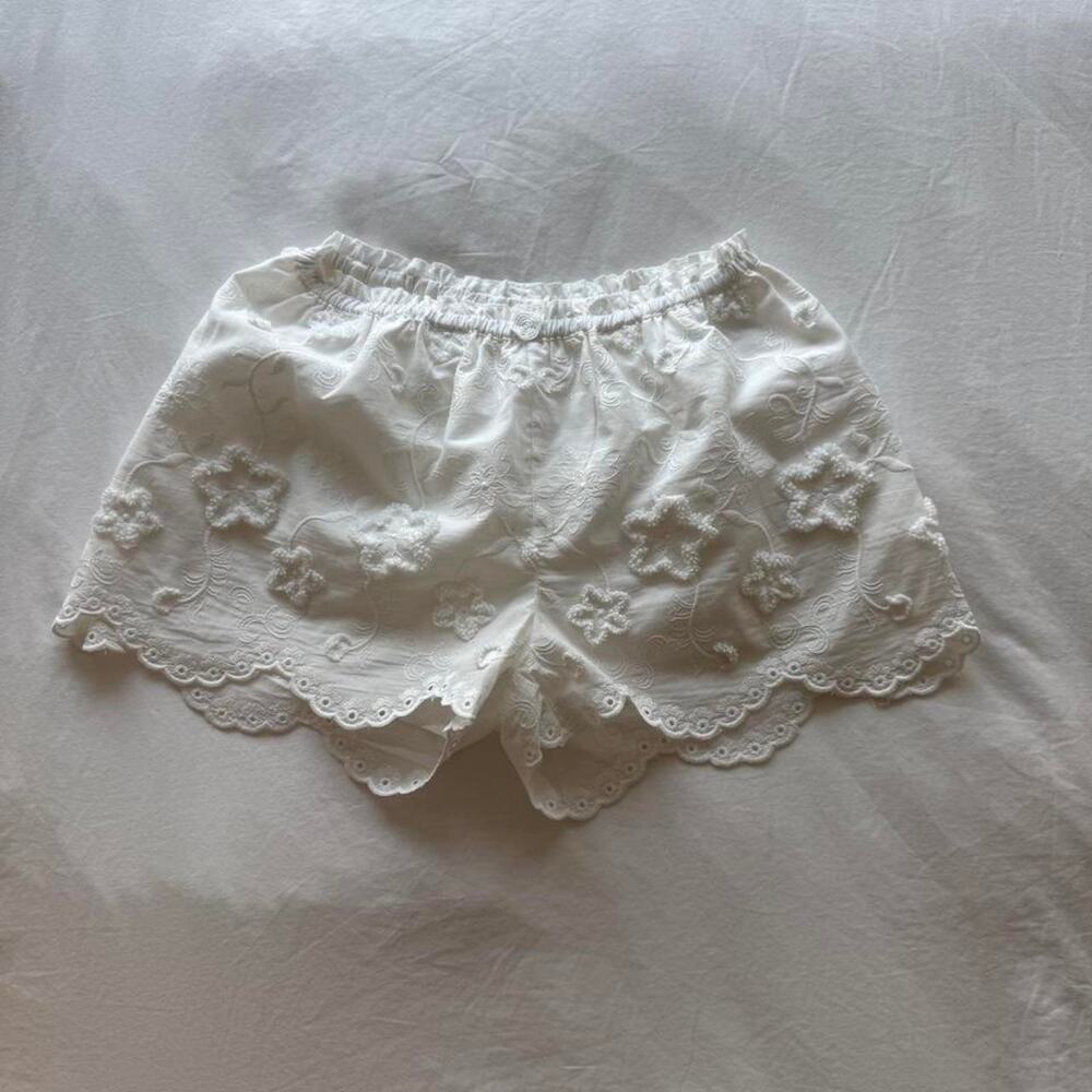 The garment copenhagen white floral embroidered shorts with